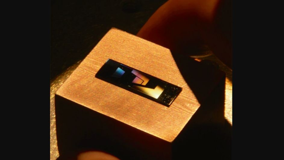 A silicon photonics chip. Credit: Mark Foster and Alexander Gaeta. Image of a chip used for nonlinear photonics and consisting of hundreds of devices.