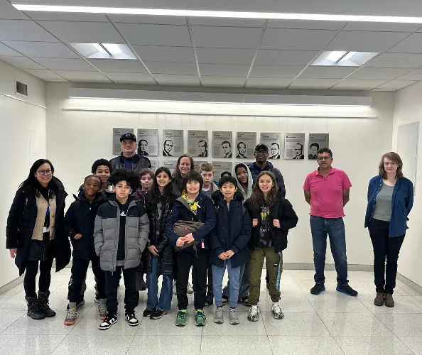 The student group & several Columbia Physics faculty members and staff in Pupin Lobby