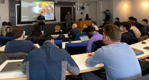 Dr. Will introduces IBM's Nick Bronn for an industry seminar this spring. Classroom for IBM's industry seminar