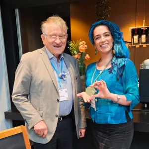 Natalie holding Klaus von Klitzing's Nobel Prize