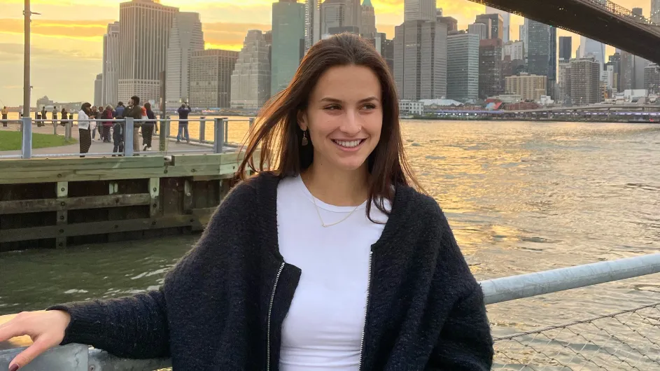 Columbia Computer Science PhD student Natalie Parham in front of the Brooklyn Bridge, New York City. 
