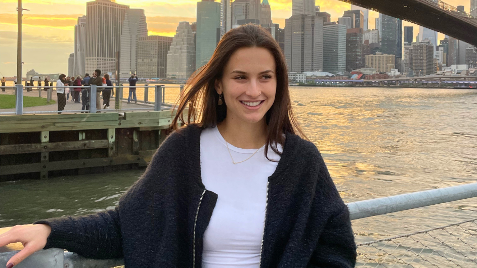Columbia Computer Science PhD student Natalie Parham in front of the Brooklyn Bridge, New York City. 