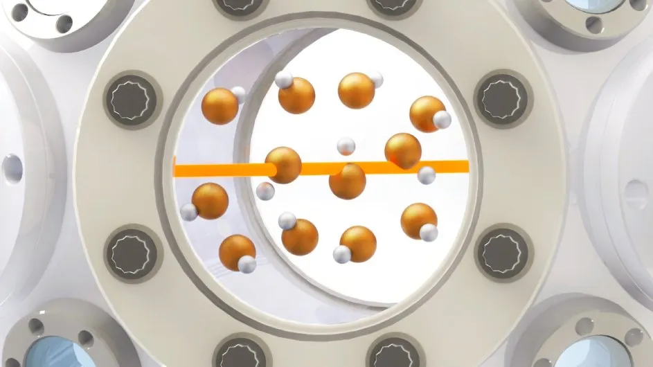 CaH molecules inside a vacuum chamber being hit with a laser