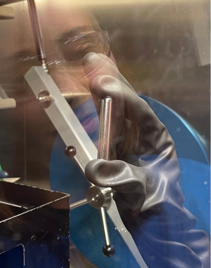 Posey holding a niobium ampule, in which all the synthetic chemistry took place to create CeSiI. Victoria Posey holding a niobium ampule inside the glovebox.